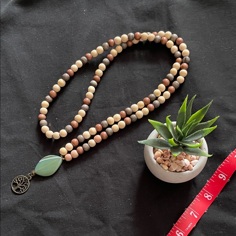 Hand assembled beaded necklace tree of life
